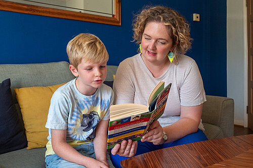 Anna reading to child